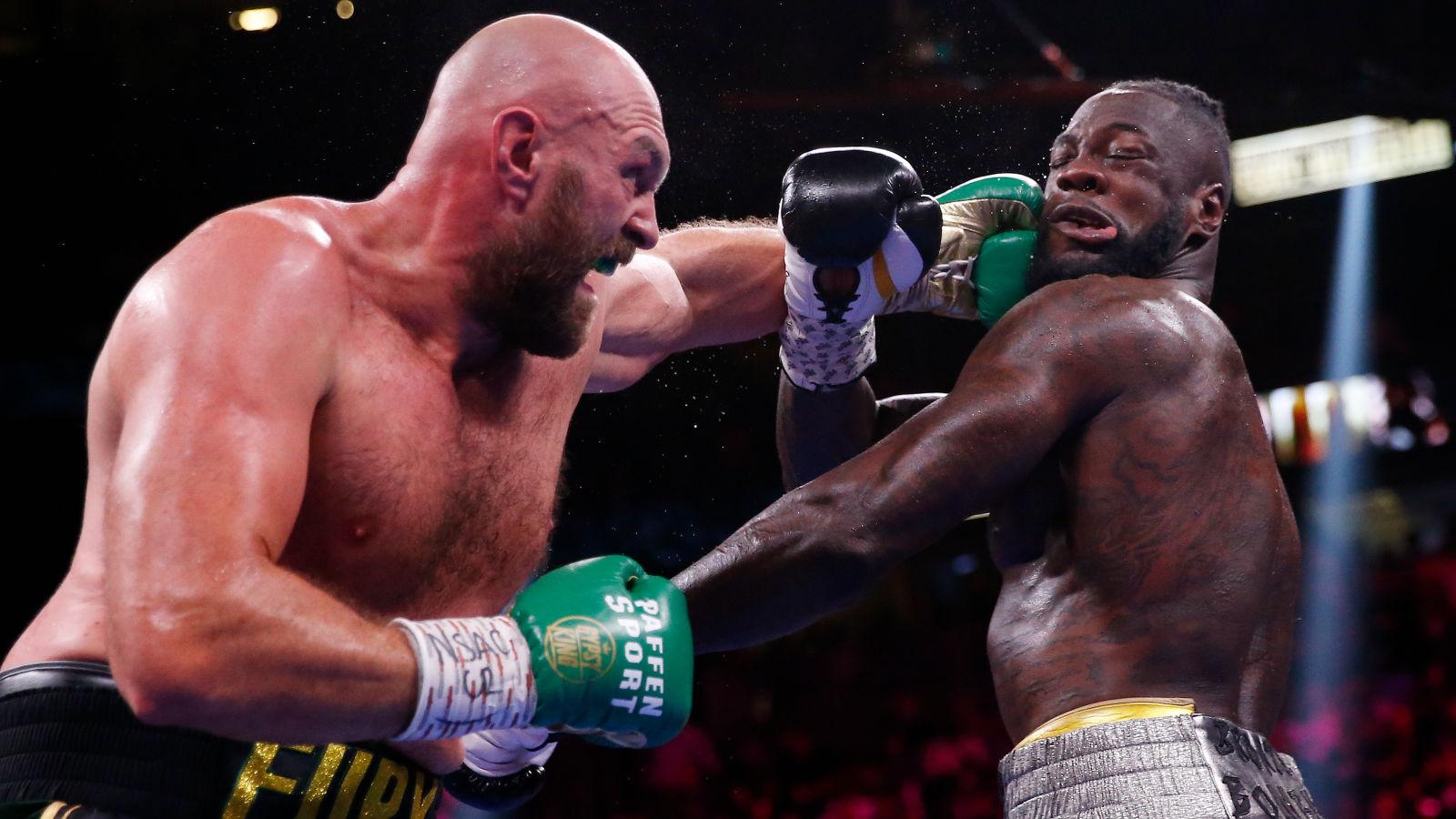 Tyson Fury catches Deontay Wilder with a left hook