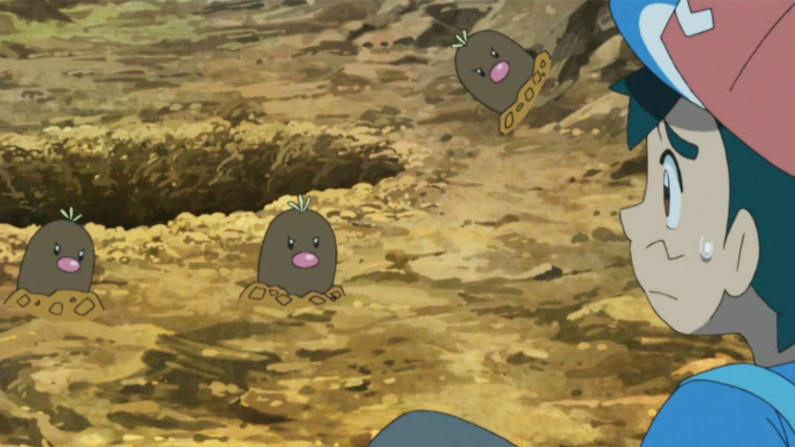 A screenshot from the Pokemon anime shows Ash being surrounded by Diglett