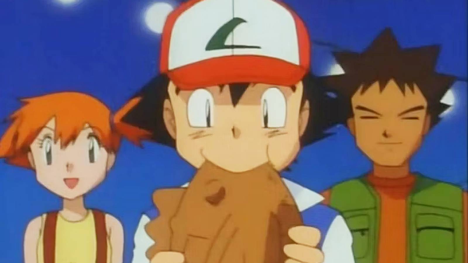 A still from the Pokemon anime shows Ash Ketchum eating a fried Magikarp