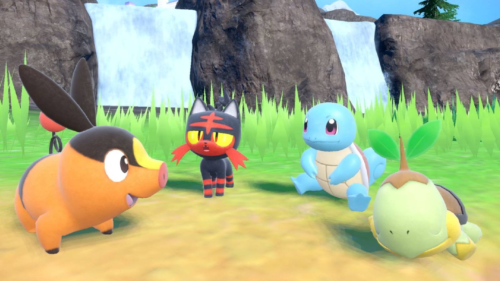 A screenshot from Pokemon Scarlet & Violet shows several starter Pokemon gathered together